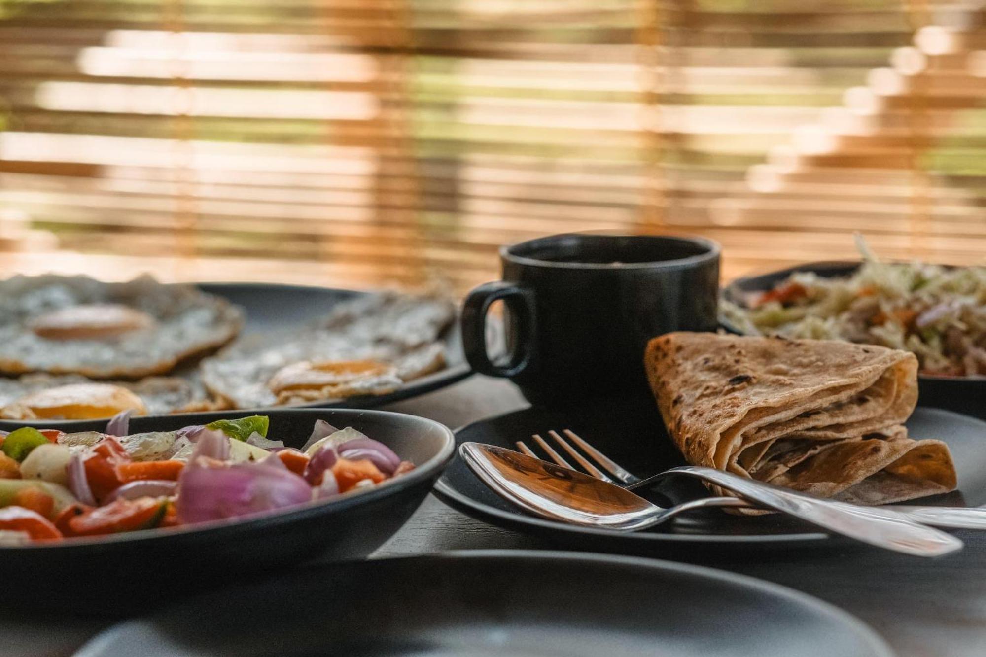 The Hideout Cottage And Restaurant Hampi Bagian luar foto